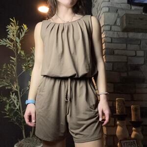 Casual brown romper with adjustable waist and tie back detail
